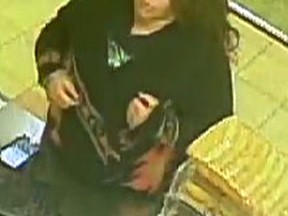Police are looking for this woman in connection with a May 24, 2015 robbery of a Henderson Highway restaurant in Winnipeg. (WINNIPEG POLICE SERVICE HANDOUT PHOTO)