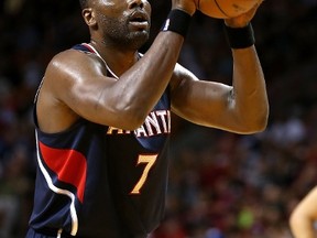 Elton Brand #7 of the Atlanta Hawks shoots a foul shotduring a game against the Miami Heat at American Airlines Arena on February 28, 2015 in Miami, Florida.   Mike Ehrmann/Getty Images/AFP