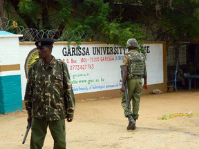 Armed security officers guard the entrance of Garissa university college, in Garissa, Kenya, Monday, Jan. 4, 2016. (AP Photo)