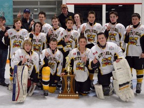 Members of the Mitchell Bantam AE hockey team celebrate their tournament victory in Ridgetown this past weekend, a kickoff to what they hope is another solid weekend when they participate in the International Silver Stick tournament in Pelham. SUBMITTED
