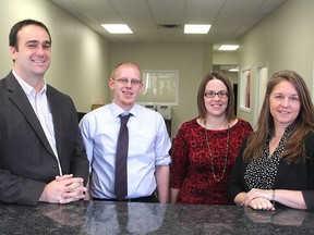 New MP Mark Gerretsen, left, joins the staff members in his constituency office in Kingston: Jeff Wagar, Allison Fisher and Ann Parker. (Michael Lea/The Whig-Standard)