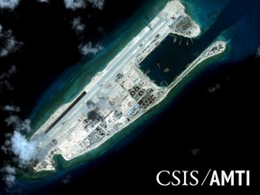 Fiery Cross reef, located in the disputed Spratly Islands in the South China Sea, is shown in this handout Center for Strategic and International Studies (CSIS) Asia Maritime Transparency Initiative satellite image taken September 3, 2015 and released to Reuters October 27, 2015. (CSIS Asia Maritime Transparency Initiative/DigitalGlobe/Handout via Reuters)