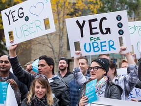 Uber supporters are seen as dual rallies of Uber and cab drivers clash outside of City Hall in September before city councillors hear feedback on a new Ride Sharing bylaw. FILE PHOTO Ian Kucerak/Edmonton Sun/Postmedia Network