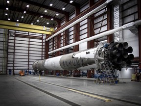 The used Falcon 9 first stage rocket is seen in a hangar at Cape Canaveral, Fla. This represents SpaceX’s first successful fly back and landing of a rocket booster.  (SpaceX via AP)