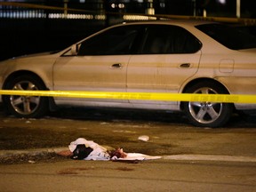 Toronto Police investigate a shooting at Dentonia Park and Thyra Ave. in East York on Monday, January 4, 2016. (Craig Robertson/Toronto Sun)