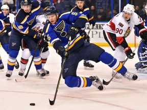 St. Louis Blues defenseman Colton Parayko (55) clears the puck against the Ottawa Senators during the first period at Scottrade Center. Mandatory Credit: Jasen Vinlove-USA TODAY