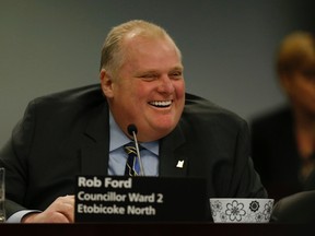 Councillor Rob Ford sports sparkling new teeth during the government management committee meeting at City Hall on Jan. 4, 2016. (Jack Boland/Toronto Sun)
