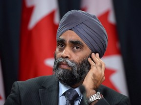 Defence Minister Harjit Sajjan is pictured at a press conference at the National Press Theatre in Ottawa, Ont., on Nov. 24, 2015. (THE CANADIAN PRESS/Fred Chartrand)