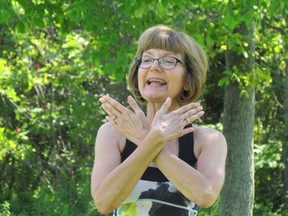 Susan Jones, shown here leading a session of Yoga in the Park at Sunset Acres Park in July, 2015, received one of this year's Community Appreciation Awards from Plympton-Wyoming Mayor Lonny Napper.
(Sarnia Observer file photo)