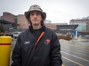Pat Brownrigg, 45, spends his days at the Montfort Hospital after his mother suffered a serious stroke while at a City of Ottawa-run nursing home in the city's centre. DANI-ELLE DUBE/OTTAWA SUN