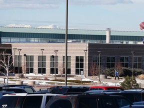 This photo taken Tuesday Jan. 5, 2016, shows Mountain Vista High School, the suburban Denver high school, in Highlands Ranch, Colo. Both 16-year-old girls accused of plotting to kill classmates were formally charged as adults with conspiracy to commit first-degree murder. (AP Photo/Brennan Linsley)