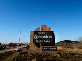 The Welcome to Edmonton, City of Champions is seen on Whitemud Drive just east of 17 St., on Tuesday March 17, 2015. The signs on each conner of the city have been in place since 1988. The debate on weather or not to change the slogan continues. Tom Braid/Edmonton Sun/Postmedia Network