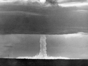 In this May 21, 1956 file photo, the stem of a hydrogen bomb, the first such nuclear device dropped from a U.S. aircraft, moves upward through a heavy cloud and comes through the top of the cloud, after the bomb was detonated over Namu Island in the Bikini Atoll, Marshall Islands. The hydrogen bomb was never dropped on any targets. It was first successfully tested in the 1950s by the U.S., in bombs called Mike and Bravo. Soviet tests soon followed. (AP Photo, File)