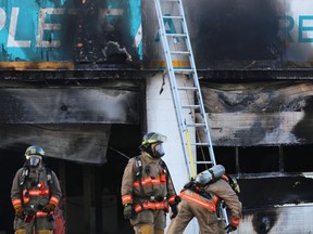 Belleville Fire responded to a large fire at T & T Mechanics on College Street East and Cannifton Wednesday morning on Wednesday January 6, 2016 in Belleville, Ont. Tim Miller/Belleville Intelligencer/Postmedia Network