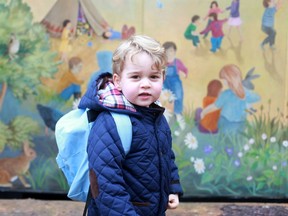 In this handout photograph provided by Kensington Palace on Wednesday, Jan. 6, 2016, taken by Kate, The Duchess of Cambridge, Britain's  Prince George poses on his first day at the Westacre Montessori nursery school near Sandringham in Norfolk, England.  (The Duchess of Cambridge/Kensington Palace via AP)