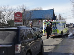 Pedestrian was struck by a vehicle at the intersection of King Street West and Mowat Avenue at approximately 11:30 a.m. on Wednesday. (Elliot Ferguson, The Whig-Standard)
