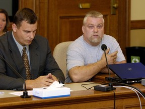 This image released by Netflix shows Steven Avery, right, in the Netflix original documentary series "Making A Murderer." An online petition has collected hundreds of thousands of digital signatures seeking a pardon for a pair of convicted killers-turned-social media sensations based on the Netflix documentary series that cast doubt on the legal process. (Netflix via AP)