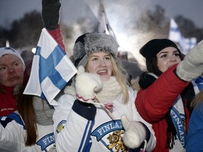 Fans wait for Team Finland to arrive to celebrate winning the 2016 world junior championship in Helsinki on Jan. 6, 2016. (Heikki Saukkomaa/Lehtikuva via AP)