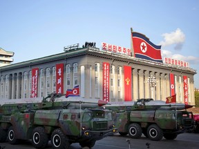 What is believed to be improved versions of the KN-08 ballistic missile are paraded in Pyongyang, North Korea, during the 70th anniversary celebrations of its ruling party's creation in this Saturday, Oct. 10, 2015, photo. (AP Photo/Wong Maye-E)