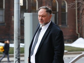Barrie dermatologist Dr. Rod Kunynetz leaves a hearing at the College of Physicians and Surgeons of Ontario during a lunchtime break Wednesday, January 6, 2016. (Jack Boland/Toronto Sun)