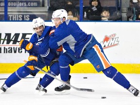 Taylor Hall participates in a drill with teammate Jordan Eberle Wednesday at Rexall Place. (The Canadian Press)