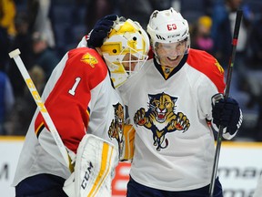 Florida Panthers right winger Jaromir Jagr celebrates with goalie Roberto Luongo after a win against the Nashville Predators at Bridgestone Arena in Nashville on Dec. 3, 2015. (Christopher Hanewinckel/USA TODAY Sports)