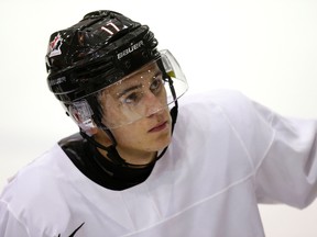 Travis Konecny listens to the coach at Team Canada practice for World Juniors in Toronto on Thursday December 10, 2015. Craig Robertson/Postmedia Network
