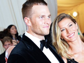 NEW YORK - Tom Brady and Gisele Bundchen attend the "Charles James: Beyond Fashion" Costume Institute Gala at the Metropolitan Museum of Art on May 5, 2014 in New York City.  (Mike Coppola/Getty Images/AFP)
