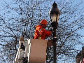 Gerber Electric Ltd. employees replacing streetlights for LED technology on Front Street in Strathroy on Wednesday, Nov. 25. JONATHAN JUHA/STRATHORY AGE DISPATCH/POSTMEDIA NETWORK