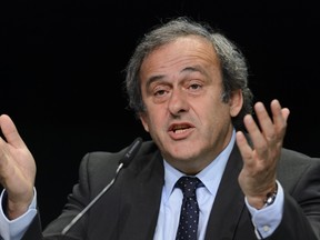 A file photo taken on May 28, 2015 shows UEFA president Michel Platini gesturing during a press conference prior to the 65th FIFA Congress in Zurich. (AFP PHOTO/FABRICE COFFRINI)
