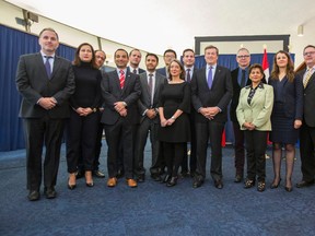 Toronto Mayor John Tory, joined with members of the federal Liberal caucus from Toronto  - poses for a photo at City Hall in Toronto, Ont. on Thursday January 7, 2016. Ernest Doroszuk/Toronto Sun/Postmedia Network