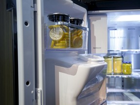 Small webcams (L) are built into the door of an Internet-connected Family Hub Fridge by Samsung during the 2016 CES trade show in Las Vegas, Nevada Jan. 7, 2016. The cameras allow the user to check the remotely check the contents of the refrigerator. The outside of the fridge door boasts a 21.5-inch touch-screen display. REUTERS/Steve Marcus