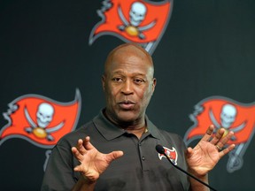 Tampa Bay Buccaneers head coach Lovie Smith gestures during his news conference in Tampa on Jan. 4, 2016. (AP Photo/Chris O'Meara)