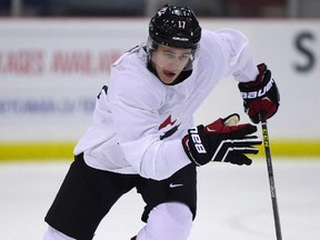 Travis Konecny, pictured here practicing with Team Canada prior to the world junior championships, was traded from the Ottawa 67's to the Sarnia Sting Wednesday night. The 18-year-old Clachan, Ont. native said Thursday he's excited to get started with his new Ontario Hockey League team. (Craig Robertson/Toronto Sun/Postmedia Network)