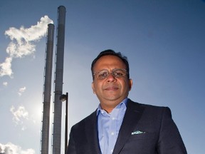 Dipesh Patel, a vice-president at London Health Sciences Centre, stands outside their co-generation plant on Commissioners Road. (MIKE HENSEN, The London Free Press)