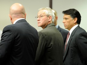 In this Thursday, April 19, 2012, file photo, Oscar Ray Bolin Jr., center, watches as the jurors walk into the courtroom  in Tampa. Bolin Jr,, who has been convicted 10 times for three separate slayings, was executed on Thursday, Jan. 7, 2016.  (Chris Urso/The Tampa Tribune via AP, Pool)