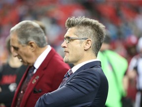 In this Dec. 27, 2015,  file photo, Atlanta Falcons general manager Thomas Dimitroff, right, stands next to owner Arthur Blank before their game against the Carolina Panthers in Atlanta. (AP Photo/John Bazemore, File)