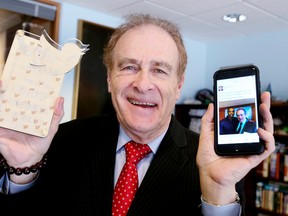 Councillor Norm Kelly holds up his award for being named Canada's Most Valuable Tweeter on Friday January 8, 2016. Veronica Henri/Toronto Sun/Postmedia Network