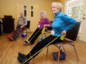 Luke Hendry/The Intelligencer 
Agnes Wilson, 93, exercises with Joyce Wilson and Bill Meaney at Aldersgate Village in Belleville Friday. They're part of a Victorian Order of Nurses class designed to improve strength, flexibility and more.
