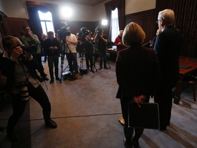 Manitoba Premier Greg Selinger and Alberta Premier Rachel Notley speak to media Friday, January 8, 2016 at the Manitoba Legislature in Winnipeg, after meeting to discuss a number of issues of importance to both Alberta and Manitoba. The premiers also signed a memorandum of understanding on shared energy and climate change priorities. THE CANADIAN PRESS/John Woods