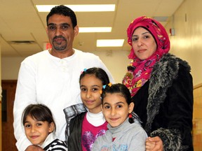 Mohammed Al-Khaleel, his wife, Diana, and their three children, from left, Rahaf, Rooal, and Raghad, are pictured together at the YMCA Learning and Career Centre on Oakdale Avenue on Friday January 8, 2016 in Sarnia, Ont. (Terry Bridge, Postmedia Network)