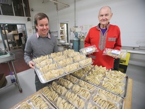 Rob Naleway (left), owner of Perogy Planet, is preparing for his grand opening tomorrow.  Perogy legend Bill (Hunky Bill) Konyk (right) will be the special guest. (WINNIPEG SUN PHOTO)