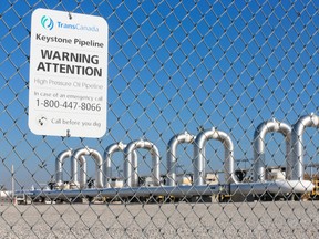 In this Nov. 3, 2015 file photo, the Keystone Steele City pumping station, into which the planned Keystone XL pipeline is to connect to, is seen in Steele City, Neb.  TransCanada filed a federal lawsuit in Houston on Wednesday, Jan. 7, 2016  alleging President Barack Obama's decision in November to kill the pipeline exceeded his power under the U.S. Constitution.  (AP Photo/Nati Harnik, File)