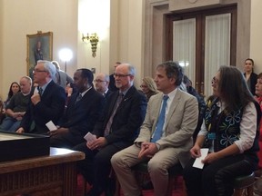 Premier Greg Selinger, left, with Order of the Buffalo Hunt recipients Abdi Ahmed, John Einarson, Gary Kobinger and Debi Spence. (DAVID LARKINS/WINNIPEG SUN PHOTO)