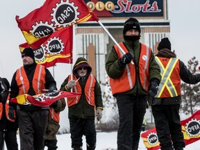 Locked-out Rideau Carleton Raceway workers picket on Friday January 8, 2016. The Ontario Lottery and Gaming Corporation (OLG) locked out about 125 workers on December 15, 2015. (Errol McGihon/Ottawa Sun/Postmedia Network)