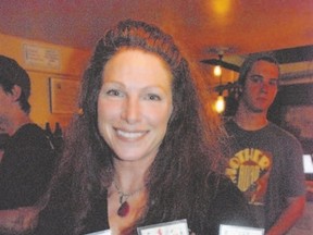 Tap room manager Sharon Lynne serves a flight at Mother Road Brewing Company in hip Flagstaff. (WAYNE NEWTON, Special to Postmedia News)