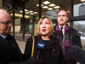 Donna Bagdan (centre), mother of Brennan Bagdan, speaks about the loss of her son Brennan in a drunk driving crash in 2013, surrounded by partner Brian Heidecker (left) and son Galen, outside Court of Queen's Bench in Edmonton, Alta., on Friday, January 8, 2016. Tyhler Keith plead guilty in the case. Victim impact statements were read in court Friday. The judge has reserved her decision until February 2016. Ian Kucerak/Edmonton Sun/Postmedia Network