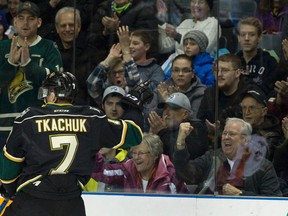 Fans cheer on London Knights forward Matthew Tkachuk as he celebrates his first period goal against the Flint Firebirds during their OHL hockey game at Budweiser Gardens in London, Ont. on Friday January 8, 2016. Craig Glover/The London Free Press/Postmedia Network