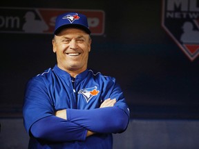 Toronto Blue Jays manager John Gibbons watches during batting practice before Game 4 of baseball's American League Championship Series against the Kansas City Royals in Toronto on Oct. 20, 2015. (AP Photo/Matt Slocum)