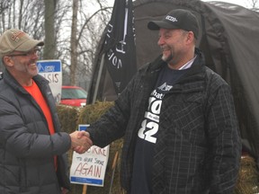 There were smiles and handshakes all around at an information picket unionized jail guards had set up in front of the Ottawa-Carleton Detention Centre on Saturday, Jan. 9, 2016. A tentative agreement reached early Saturday will means guards like Todd Hockey, left, and Brad Fleming will not go out on strike Sunday.
Corey Larocque/ Ottawa Sun